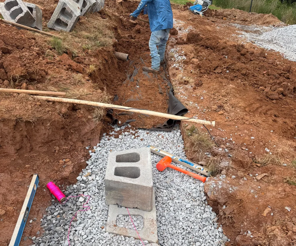 Retaining wall installation work in progress